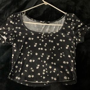 crop top, never worn,has little daisys on it